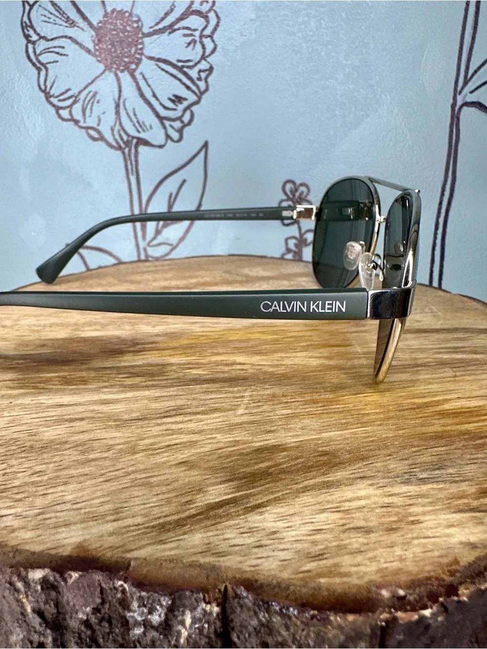 Calvin Klein Men’s Silver Frame Sunglasses with Black Lenses